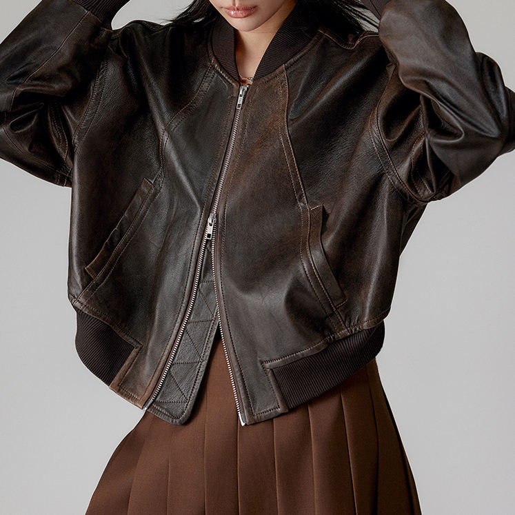 Short leather biker jacket, side view