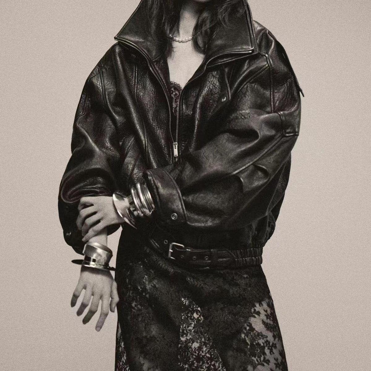 Oversized high collar leather moto jacket, side view